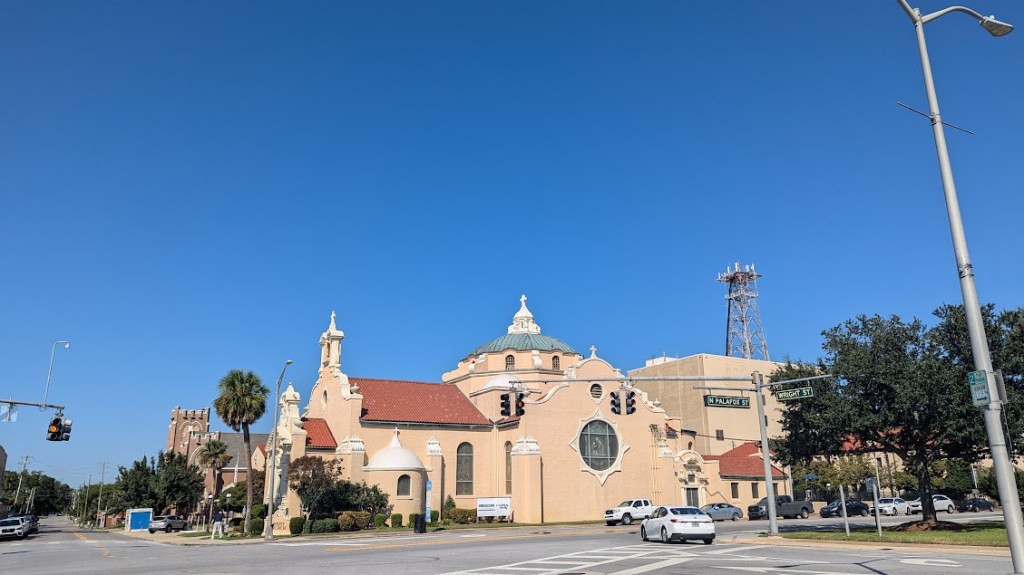 A cream-colored Spanish revival church
