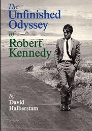 Sad RFK walks on a beach 