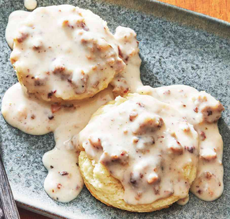 Biscuits covered in sausage gravy. Hey, mama, pass the milk