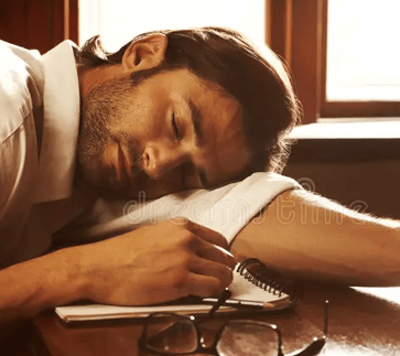 An author sleeping. (Not THE author, THE author has a proper beard and not a three-day beardlet.)